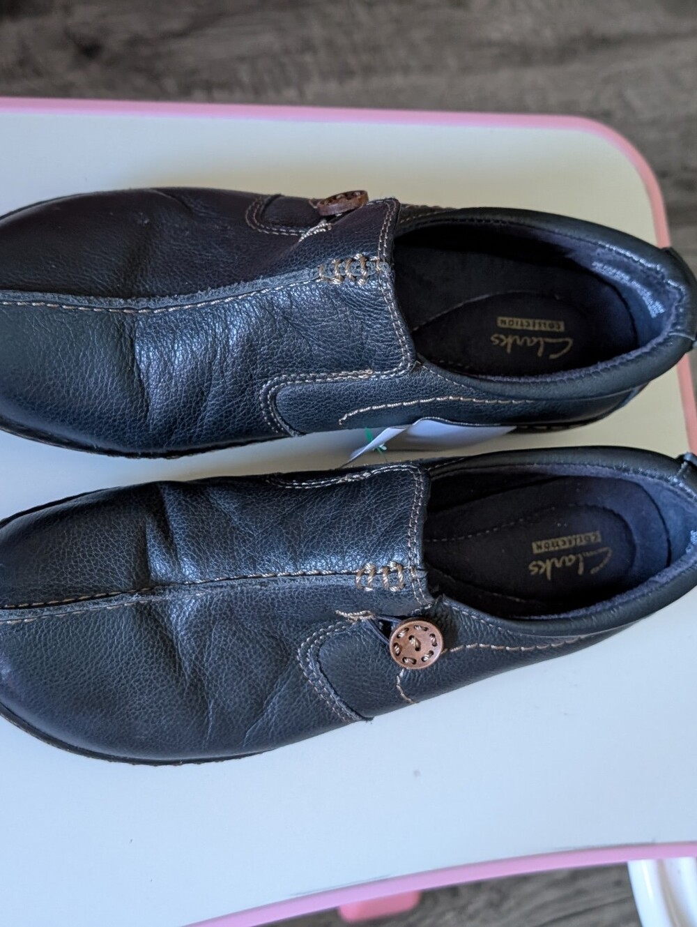 Clarks Black Leather Slip-On Loafer with Button Accent